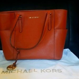 Michael Kors orange handbag
